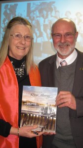 MLA Peter Crisp with Helen and her book