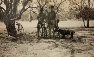Bill Pearson (left) and Harold Pearson (right) duck hunting with their dog at Lock 4